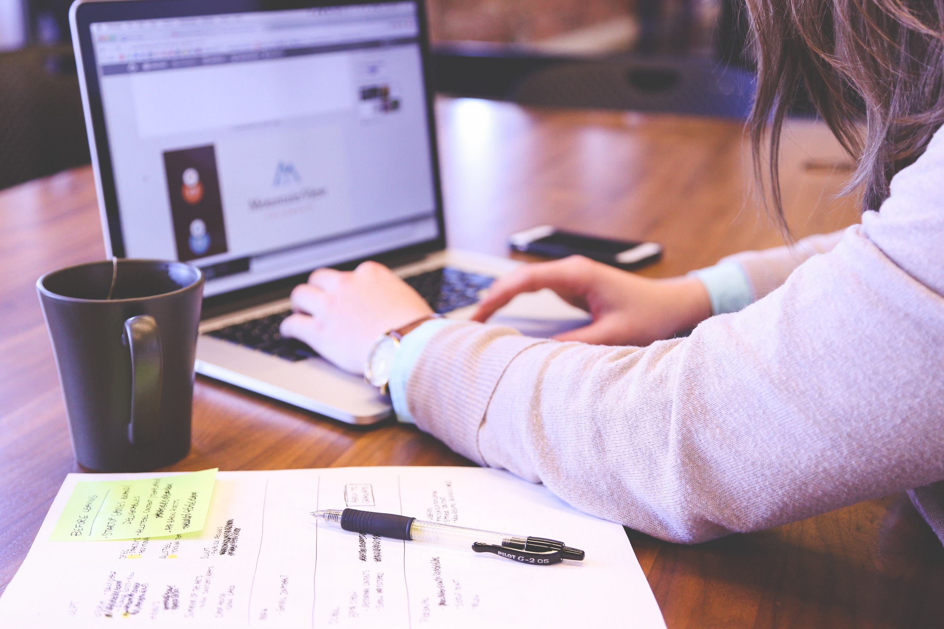 Person researching for business on a computer